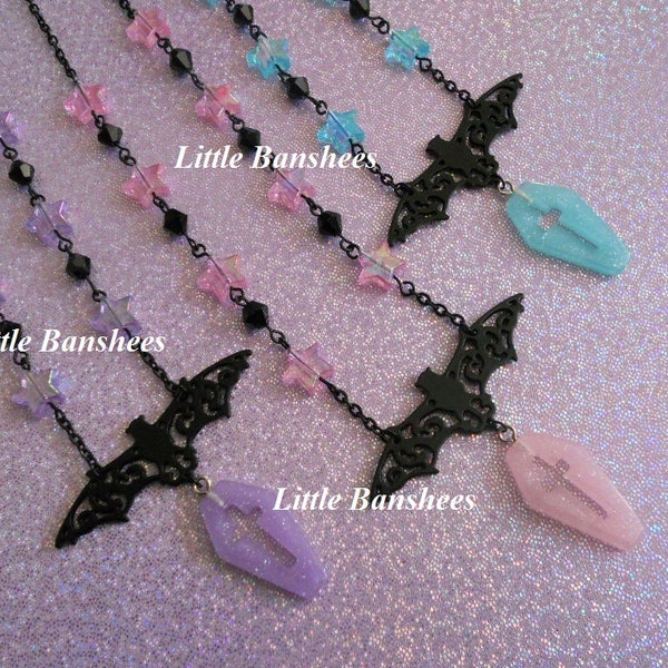 bat and coffin cross necklace with stars pastel goth pink blue purple black