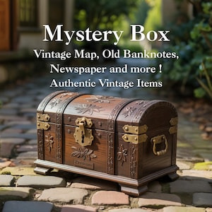 May include: A wooden treasure chest with brass hardware and floral carvings. The chest is labeled "Treasure" and the text above reads "Mystery Box, Vintage Map, Old Banknotes, Newspaper and more! Authentic Vintage Items."
