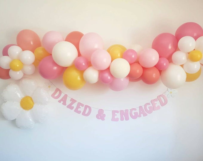 Dazed and engaged,retro bachelorette,bachelorette decor, bachelorette party,70's bachelorette,groovy,retro balloon garland,daisy balloons