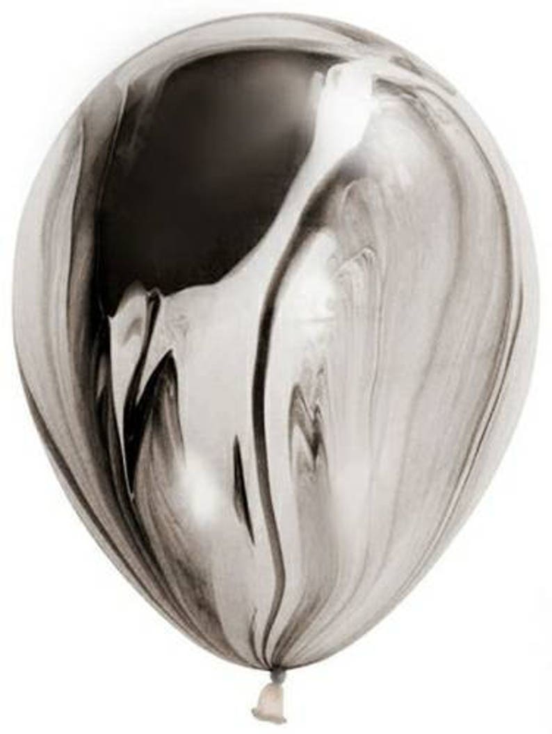 May include: A black and white marbled balloon. The balloon is made of latex and has a shiny finish.