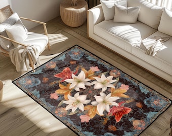 May include: A rectangular rug with a dark background and a floral design. The rug features large white lilies, orange and red flowers, and a border with blue and gold accents. The rug is placed on a wooden floor.