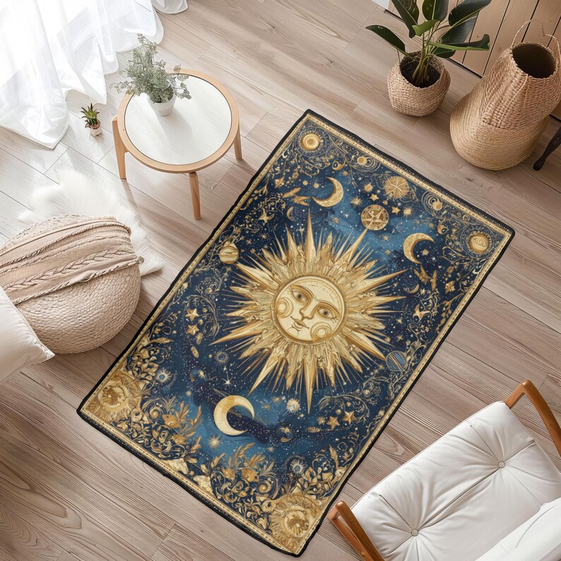 May include: A rectangular rug with a celestial design. The rug features a large, smiling sun in the center, surrounded by moons, stars, and other celestial elements. The color palette includes shades of blue, gold, and cream.
