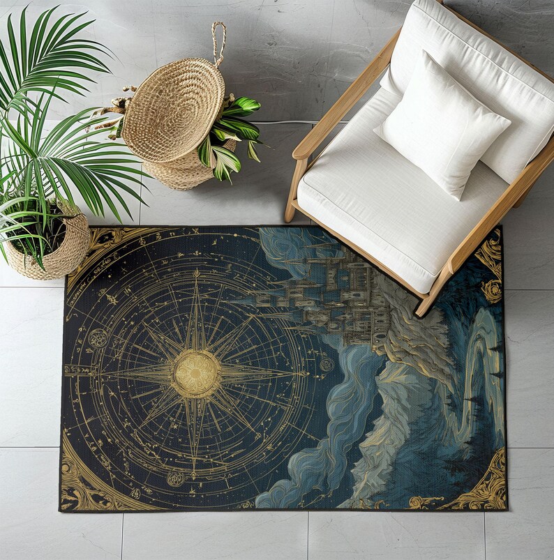 May include: A rectangular rug with a celestial map design. The rug features a large compass rose in gold against a dark blue background. The design includes constellations and a detailed illustration of a city and mountains.
