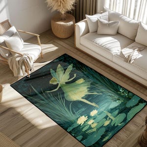 May include: A rectangular area rug featuring a whimsical fairy design. The rug showcases a fairy in a flowing green dress, surrounded by aquatic plants and lily pads in shades of green and yellow. The background is a dark, moody depiction of a pond.