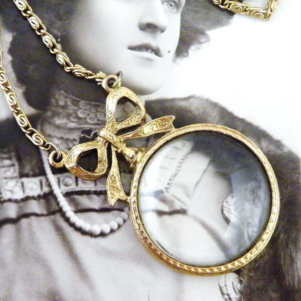 Loupe magnifying glass necklace gold plated vintage bow top pendant