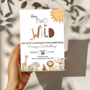 May include: A white invitation card with the text "Born Two Be Wild" and a watercolor sun illustration. The card includes details for a birthday celebration, featuring safari animals like a giraffe, hippo, monkey, lion, and elephant.