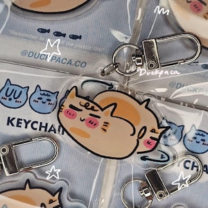 spinning cat keychain | illustrated | acrylic linked keychain | doodle | cute | funky | derpy | trinket lovers | kitty | catto | charms