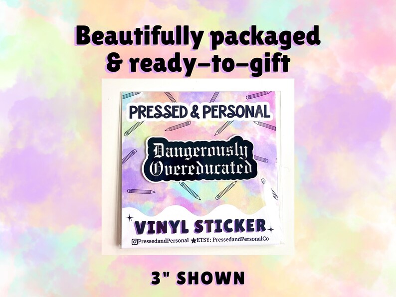 May include: A square vinyl sticker with the text "Dangerously Overeducated" in a decorative font. The sticker is surrounded by pencil illustrations and the words "PRESSED & PERSONAL" and "VINYL STICKER". The sticker is 3 inches in size.