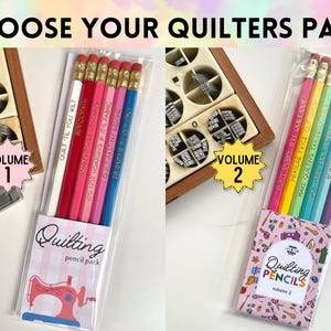 May include: Two sets of pencils labeled Volume 1 and Volume 2, each in clear plastic packaging. Volume 1 contains six pencils in white, red, pink, and blue with text. Volume 2 contains six rainbow-colored pencils with text and a patterned label.