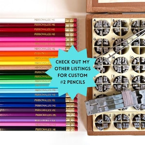 May include: A collection of colorful #2 pencils with the text "PERSONALIZE ME" printed on them. A wooden box with metal letter stamps and tools is also visible. The image includes the text "CHECK OUT MY OTHER LISTINGS FOR CUSTOM #2 PENCILS".
