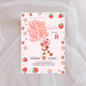 May include: A pink birthday invitation featuring a cartoon strawberry girl holding heart-shaped balloons. The invitation includes the text "You're Invited!" and details for a party on June 6th for a child turning 8.