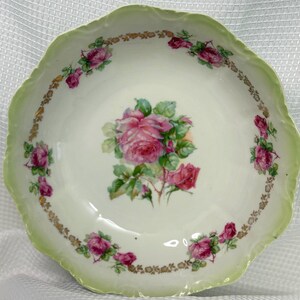Vintage German  porcelain serving  bowl with a scalloped edge,