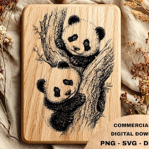 May include: A wooden cutting board with a detailed engraving of two panda bears nestled in a tree. The pandas are black and white, and the tree is brown. The board has rounded corners and the text "Art Flow Design".