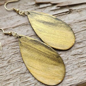 Abstract hand painted lightweight wood earrings. Unique, original wearable art. Classic, elegant, black and gold!