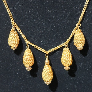 Vintage 5 Pendant Gold Tone Necklace