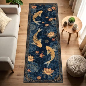 May include: A rectangular navy blue rug featuring a koi fish design. The rug has a dark blue background with gold koi fish, lotus flowers, and decorative borders. The rug is placed on a wooden floor.