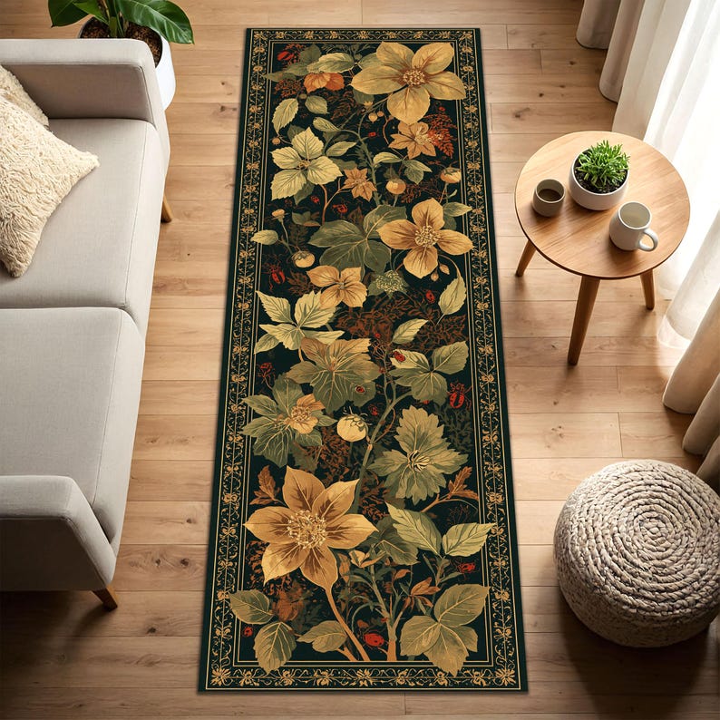 May include: A rectangular floral rug with a dark green background and a detailed border. The rug features large yellow and green flowers, leaves, and berries. The rug is placed on a wooden floor.