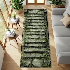 May include: A rectangular rug featuring a stone staircase design. The steps are a mix of gray and green, with moss growing between the stones. The rug is placed on a wooden floor, with a sofa and side tables in the background.