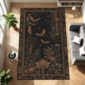 May include: A rectangular area rug with a dark background featuring bats, a crescent moon, stars, and floral and forest elements. The rug has a decorative border and is designed with a gothic or Halloween theme.