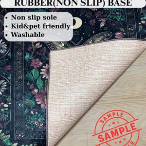 May include: A dark floral patterned rug with a rubber non-slip base. The rug features a design with flowers and leaves in shades of green, purple, and pink. The text on the rug says it is non-slip, kid and pet friendly, and washable.