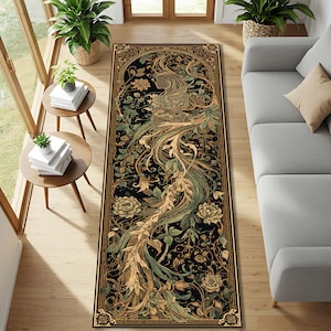May include: A long, rectangular rug with an Art Nouveau design. The rug features a black background with a detailed illustration of a stylized bird with flowing feathers in shades of gold, green, and beige. Floral and vine motifs frame the central design.