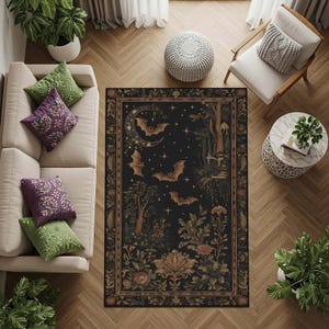 May include: A rectangular area rug with a dark background featuring a whimsical design. The rug showcases bats, a crescent moon, stars, and floral elements in shades of brown, gold, and green. The rug is bordered with a decorative frame.
