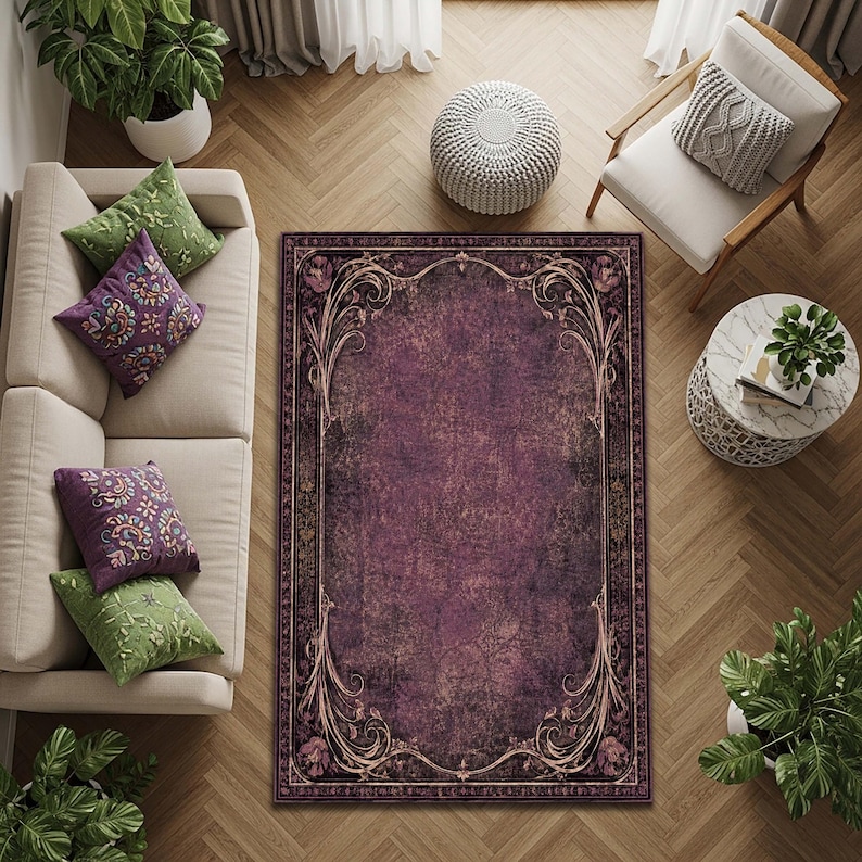 May include: A rectangular area rug featuring a deep purple center with a distressed, weathered texture. The rug is framed by an ornate, dark border decorated with intricate, light-colored scrolling floral patterns and vine-like motifs.