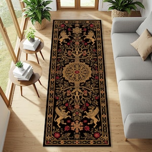 May include: A black rectangular rug with an elaborate gold and red pattern. The rug showcases mythical beasts, floral designs, and a central tree-like element. The rug is laid on a wooden floor.