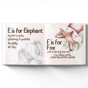 May include: An open book with two pages. One page has a grey elephant illustration and the text "E is for Elephant". The other page has a red fox illustration and the text "F is for Fox".