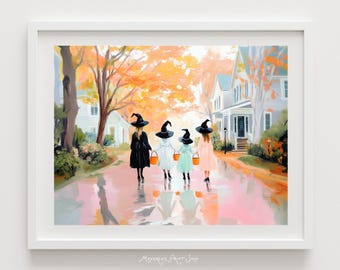 May include: A framed print depicts four figures in witch hats and dresses walking down a street. They carry orange and white buckets. The background features autumn trees and houses, creating a Halloween theme.