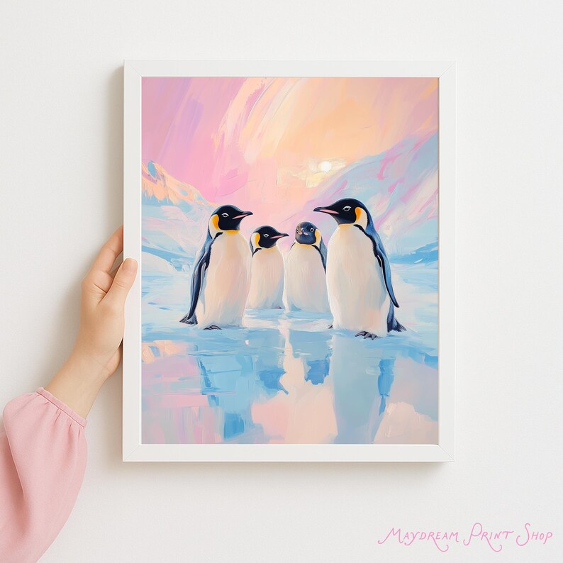 May include: A framed art print featuring four penguins standing on ice, with a colorful sunset and mountains in the background. The penguins have black heads, yellow accents, and white bellies. The artwork is in a painterly style.