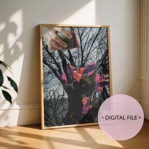 May include: A framed art print featuring a surreal collage. A hand pours red liquid from a speckled cup onto a tree with colorful, abstract shapes. The background shows bare tree branches against a cloudy sky. The print is labeled "DIGITAL FILE."