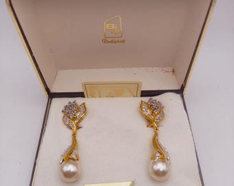 Troc Echange Paire Boucle d'oreille ancienne en ivoire massif sur