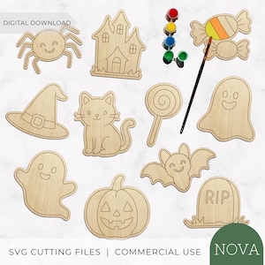 May include: A set of unfinished wooden Halloween-themed cutouts including a spider, haunted house, candy, witch hat, cat, lollipop, ghost, bat, pumpkin, and tombstone with RIP text, accompanied by a paintbrush and small paint pots.