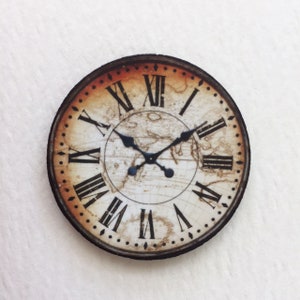 May include: A round, antique-style clock face with Roman numerals and a world map design. The clock face is cream-colored with black markings and hands.