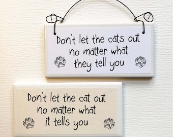 Funny Warning Sign  Don't Let The Cat Out No Matter What It Tells You