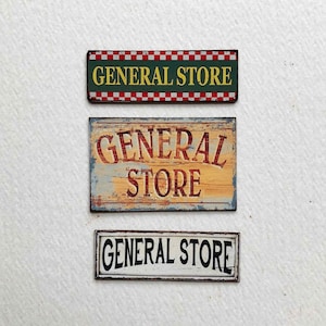 Letreros en miniatura para tiendas de artículos generales, ideales para exhibiciones en tiendas de campo o de antigüedades.