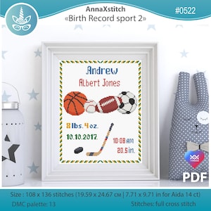 May include: A framed cross-stitch birth record with the name "Andrew Albert Jones" and sports-themed illustrations. The design includes a basketball, baseball, football, and soccer ball, along with the baby's weight, date, time, and length (20.5 inches).