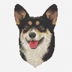 May include: A cross-stitch pattern of a smiling dog's face. The dog has black, brown, and white fur, with a pink tongue sticking out. The background is white, and the pattern is made up of small, square stitches.