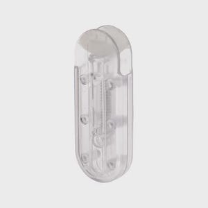 May include: A clear plastic, rectangular object with rounded ends. The object has a hinged top and internal mechanisms visible through the transparent material. The design includes small circular features and a central, vertical component.