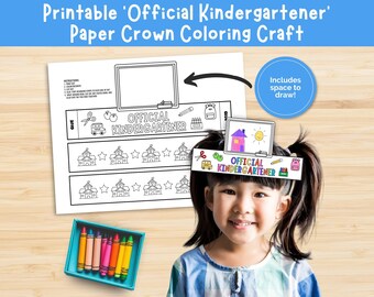 May include: Printable paper crown coloring craft for kindergarteners. The design includes a space to draw, with the text "Official Kindergartener". A box of colorful crayons is also visible.