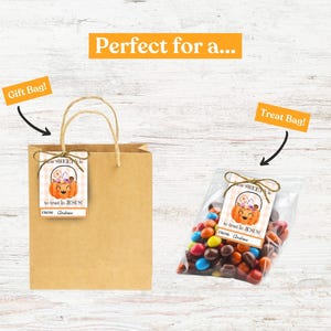 May include: A brown paper gift bag and a clear treat bag filled with colorful candies. Both bags have tags with a pumpkin illustration and the text "to trust in JESUS!" and "FROM: Andrew". The image also includes the text "Perfect for a..." and "Gift Bag!" and "Treat Bag!"