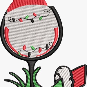 May include: Embroidered Christmas wine glass design. The glass features a red Santa hat, a string of red and green lights, and a green base. The design is on a white background.
