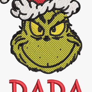 May include: Embroidered design featuring the Grinch wearing a Santa hat. The Grinch's face is green with yellow eyes and a mischievous grin. The text "DADA GRINCH" is embroidered in red and yellow.
