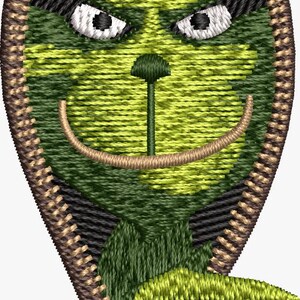 May include: Embroidered patch featuring a green Grinch face with a Santa hat. The design is enclosed in a brown zipper frame. The Grinch has a mischievous expression, with a curved smile and furrowed brow. The patch is suitable for clothing or accessories.