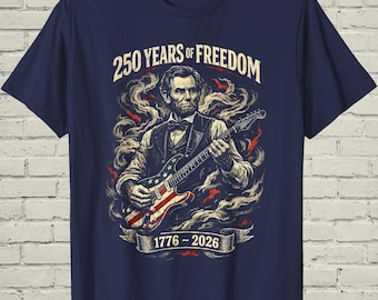 Funny Lincoln Playing Guitar Shirt, Retro 250 Years Of USA Freedom Apparel, 1776 To 2026 Patriotic 4th Of July Gift For Musician