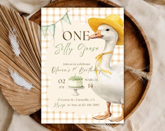 May include: A whimsical birthday invitation featuring a watercolor illustration of a goose wearing a yellow hat and ribbon. The invitation has the text "ONE Silly Goose" and details for Olivia's 1st birthday, set against a checkered background.