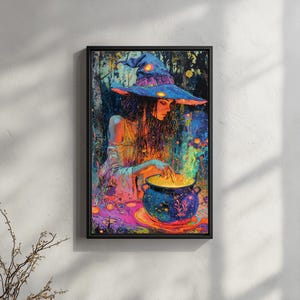 May include: A framed art print depicts a witch in a colorful scene. She wears a large blue hat and a flowing dress, leaning over a bubbling cauldron. The artwork features vibrant colors and a mystical forest background, with glowing orbs.