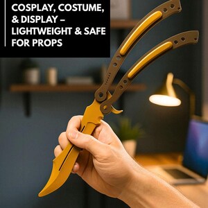 May include: A yellow and brown butterfly knife prop. The prop has a yellow blade and handle with brown accents. The text on the image reads: COSPLAY, COSTUME, & DISPLAY - LIGHTWEIGHT & SAFE FOR PROPS.