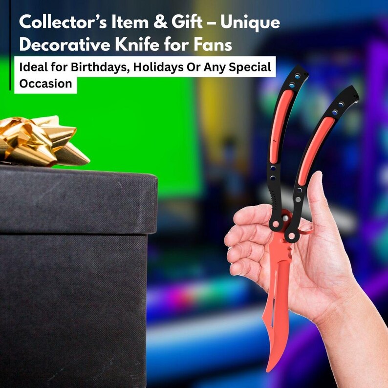 May include: A decorative butterfly knife with a red blade and black handle is held in a hand. The knife is open, displaying its full length. The text "Collector's Item & Gift - Unique Decorative Knife for Fans" is visible.